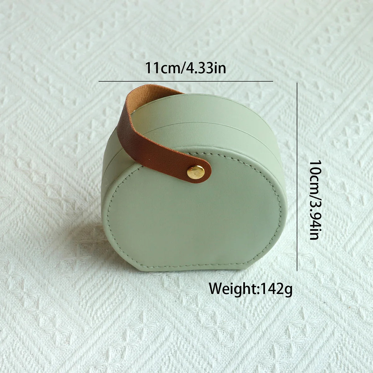 Écrin à Bijoux Portable — Boîte Ronde en Cuir avec Poignée Dorée