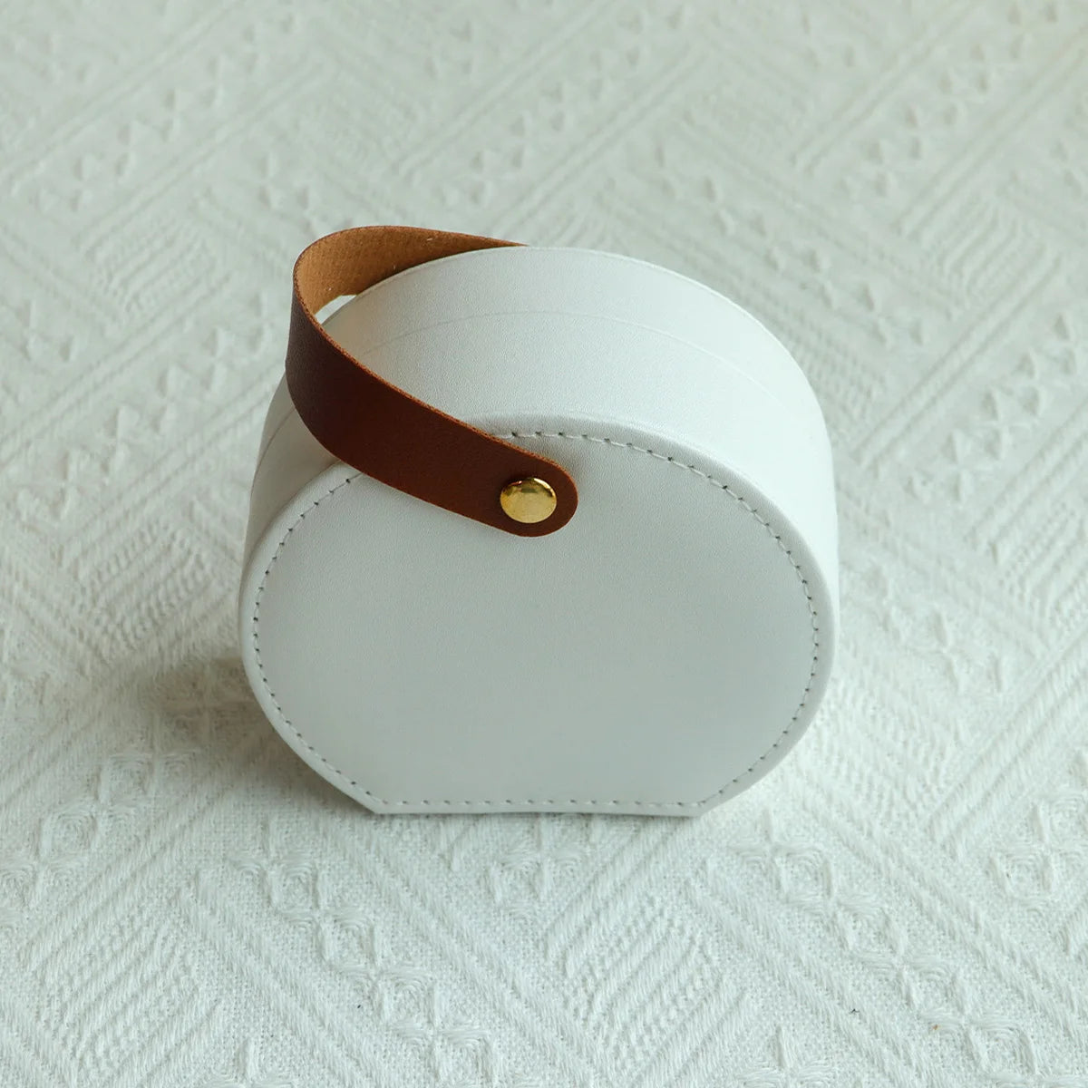 Écrin à Bijoux Portable — Boîte Ronde en Cuir avec Poignée Dorée