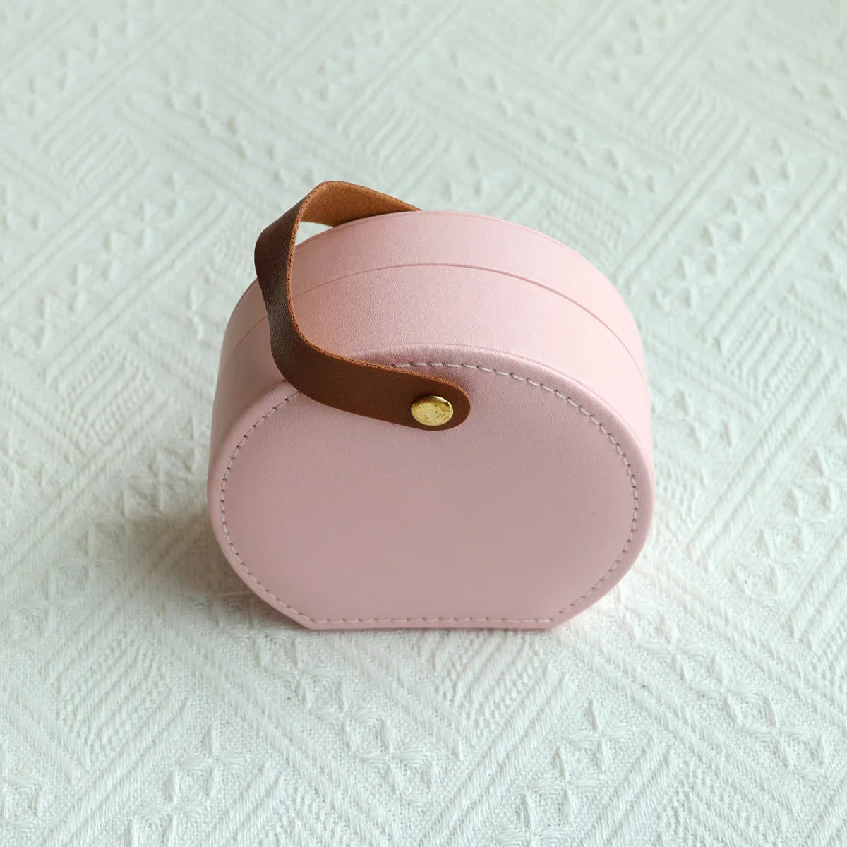 Écrin à Bijoux Portable — Boîte Ronde en Cuir avec Poignée Dorée